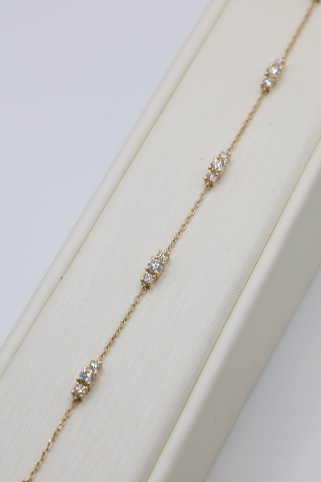 Zari diamond station bracelet in 14 karat yellow gold
