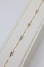 Zari diamond station bracelet in 14 karat yellow gold